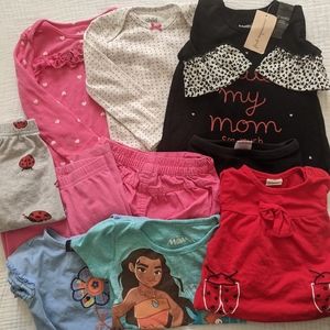 Cute bundle of baby girl clothes
